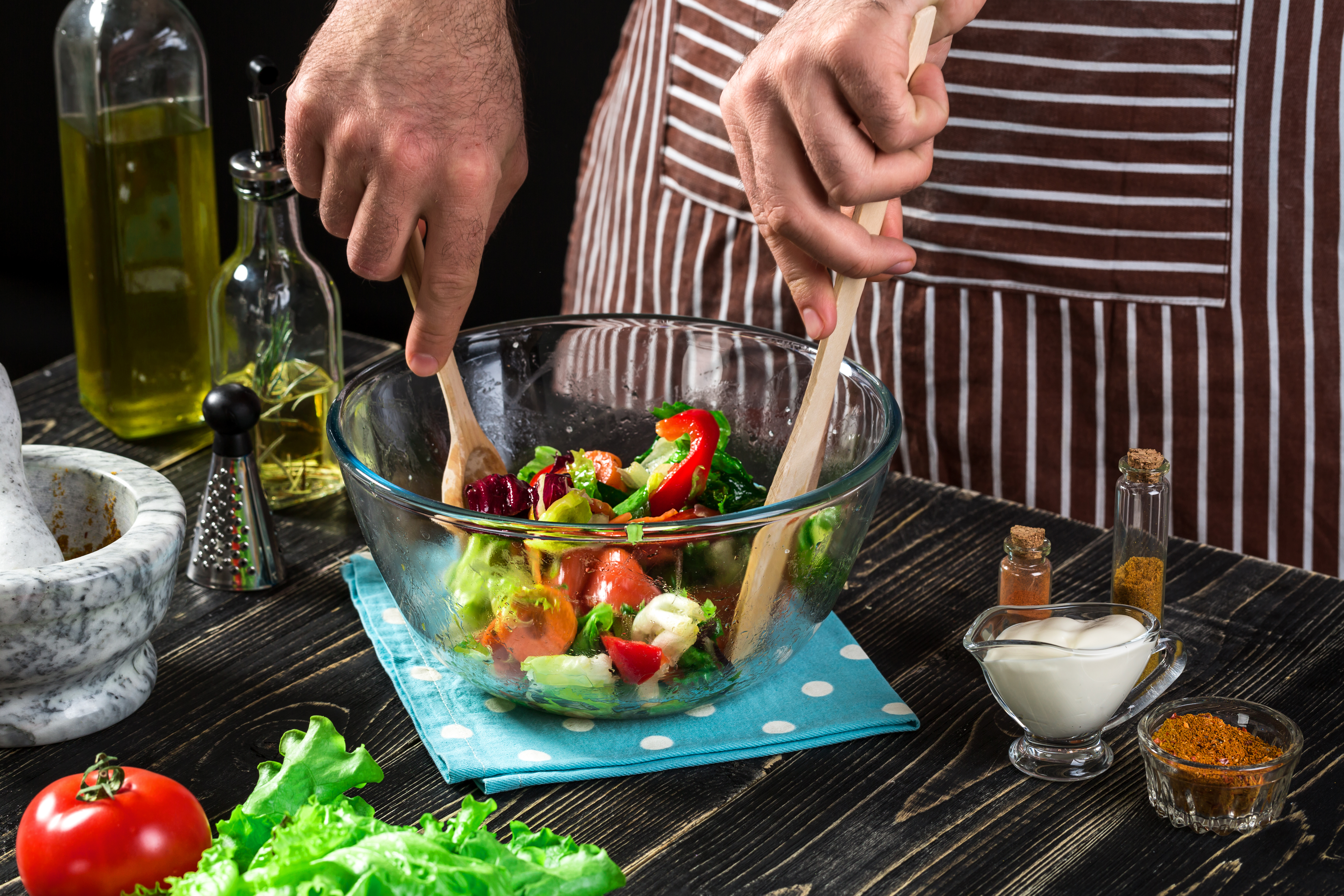 Preparing Mediterranean diet with the healthy olive oil.